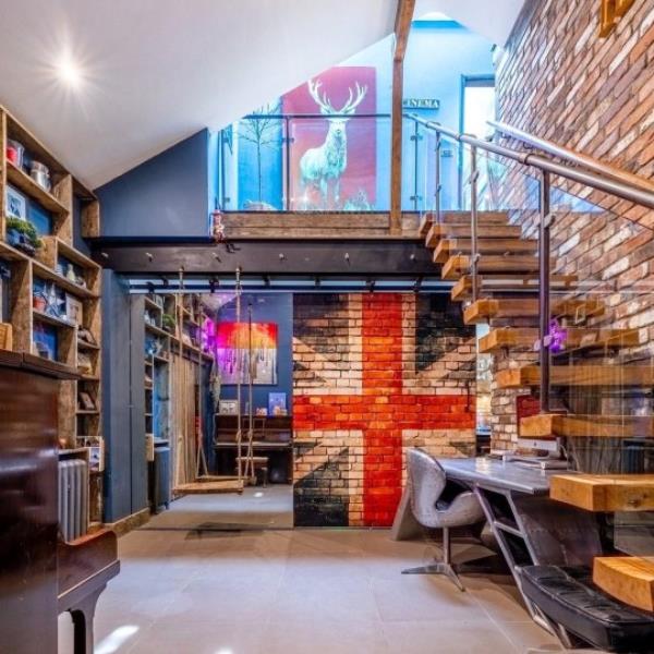The Haven's swing, union jack brick wall and statement staircase
