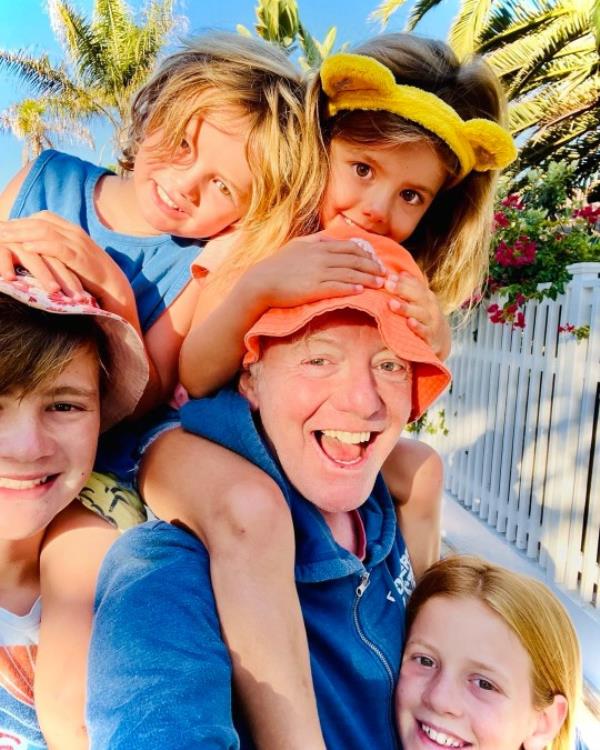 Chris Evans and his children posing for a selfie in Instagram